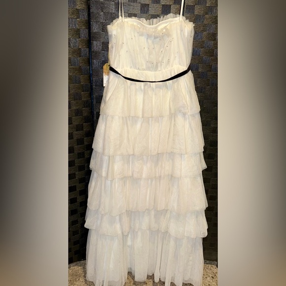 Floor-sweeping tulle, faux pearls, & a velvet belt pull this gorgeous look - Picture 6 of 6